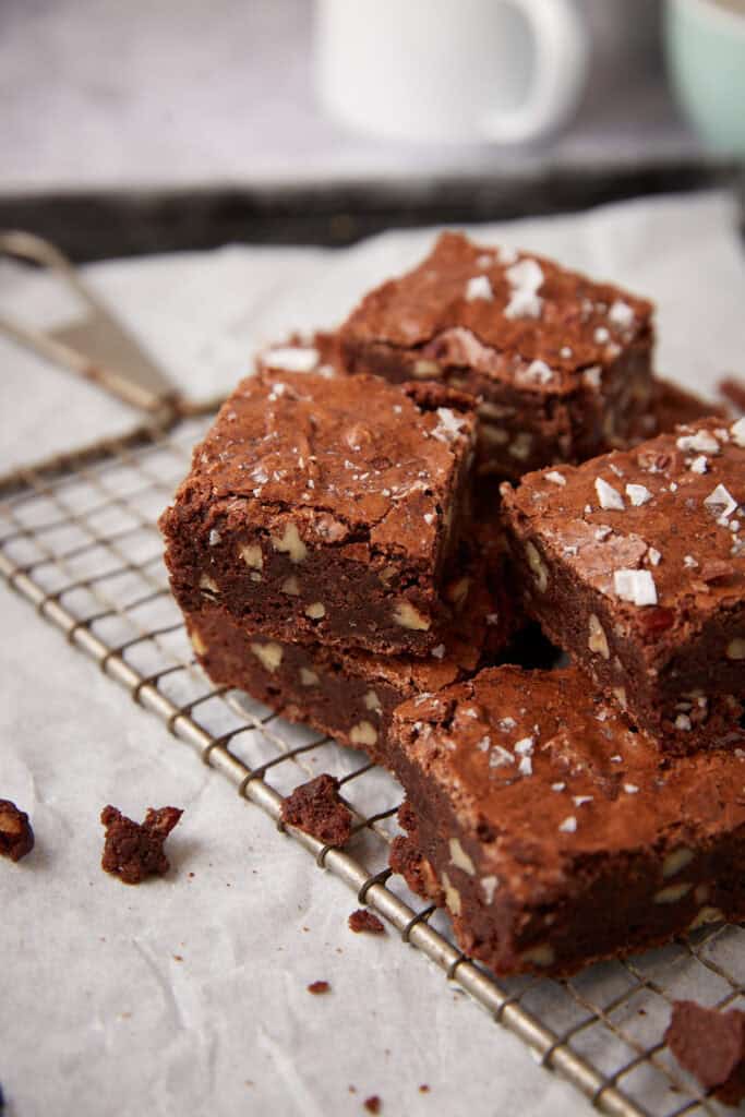 pecan brownies on a wire rack. 