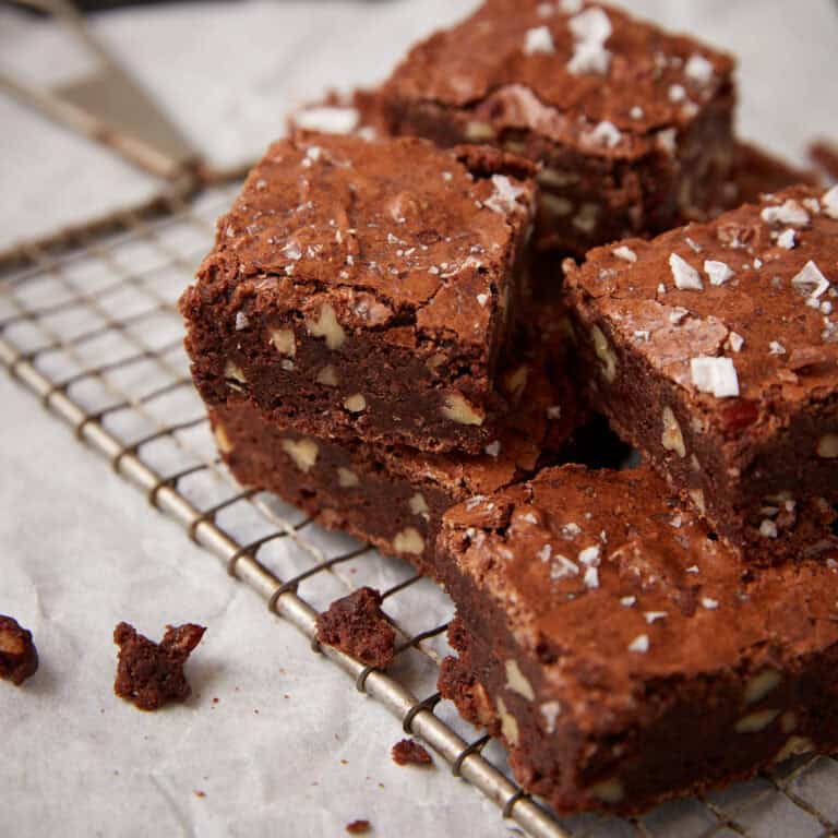 pecan brownies on a wire rack.
