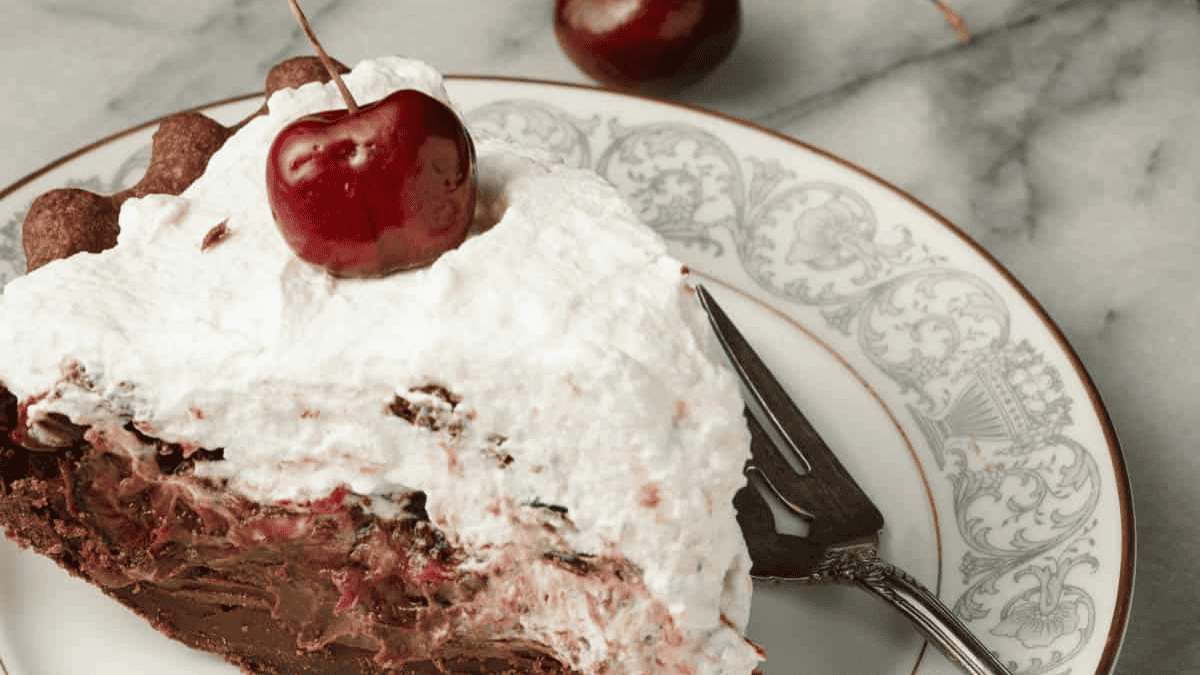 black forest pie slice on a plate.