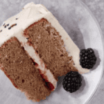 blackberry jam cake slice on a plate.