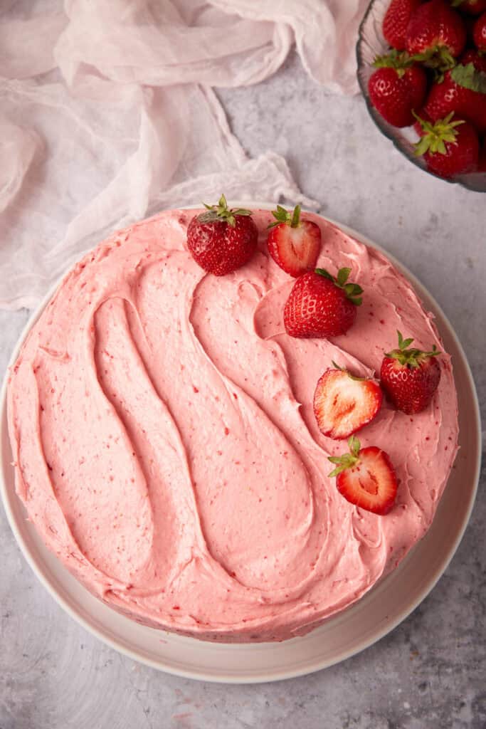 strawberry cake on a white plate.