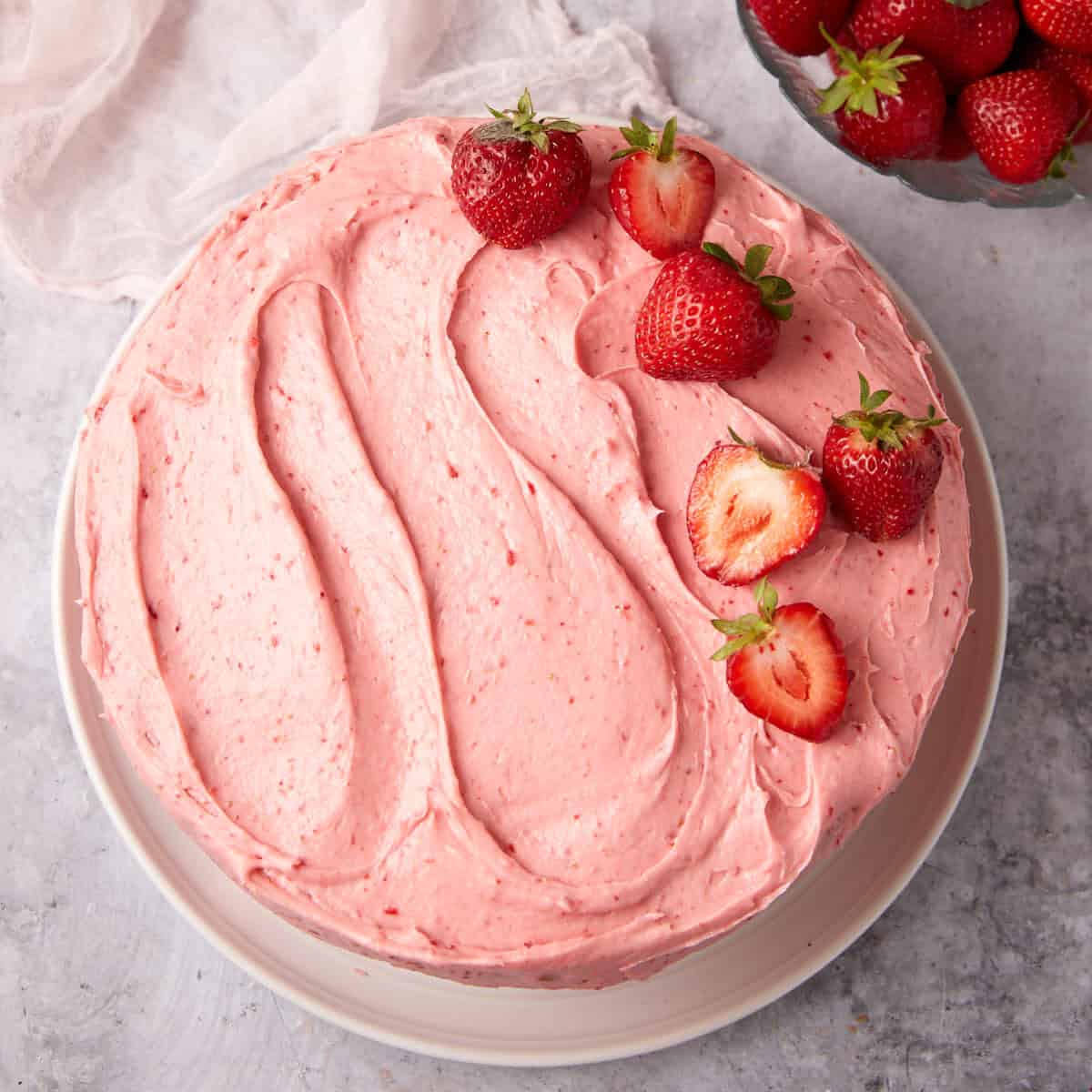 strawberry cake on a white plate.