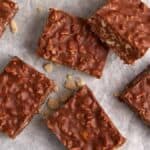 Chocolate rice krispie squares on a tray.