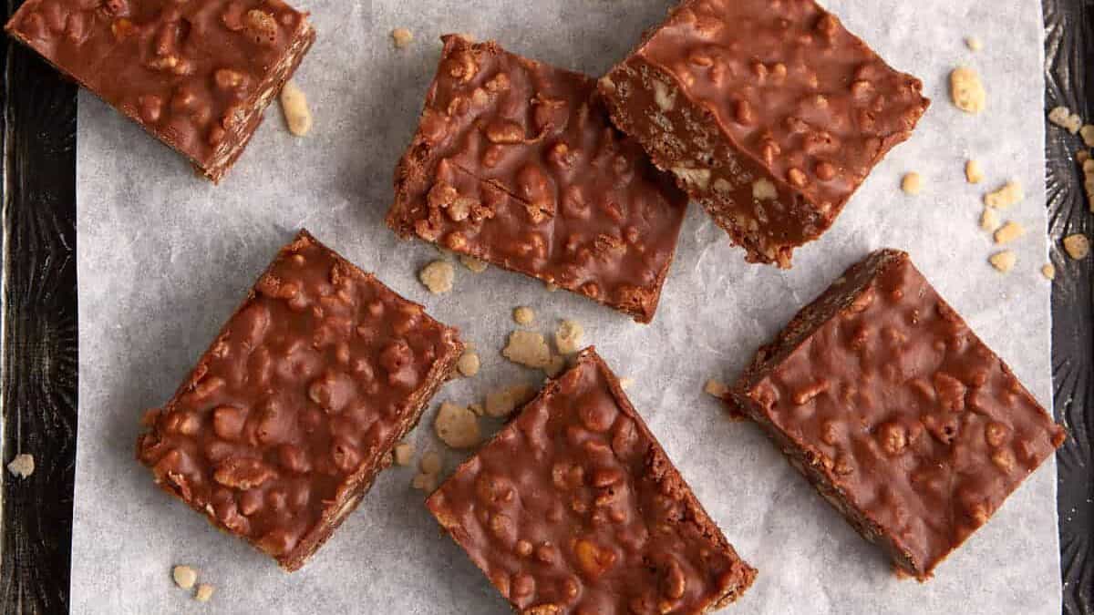 Chocolate rice krispie squares on a tray.