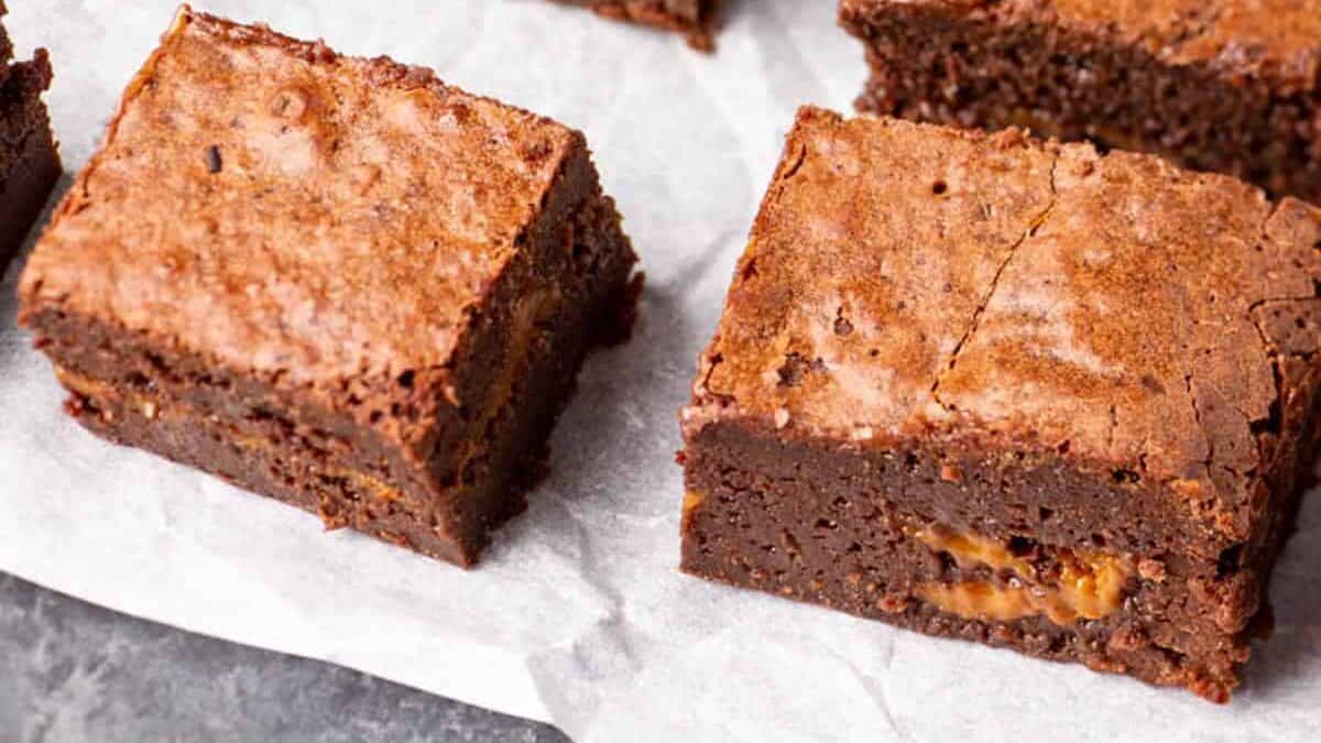 dulce de leche browneis on parchment paper. 