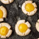 Lemon curd cookies on a tray.