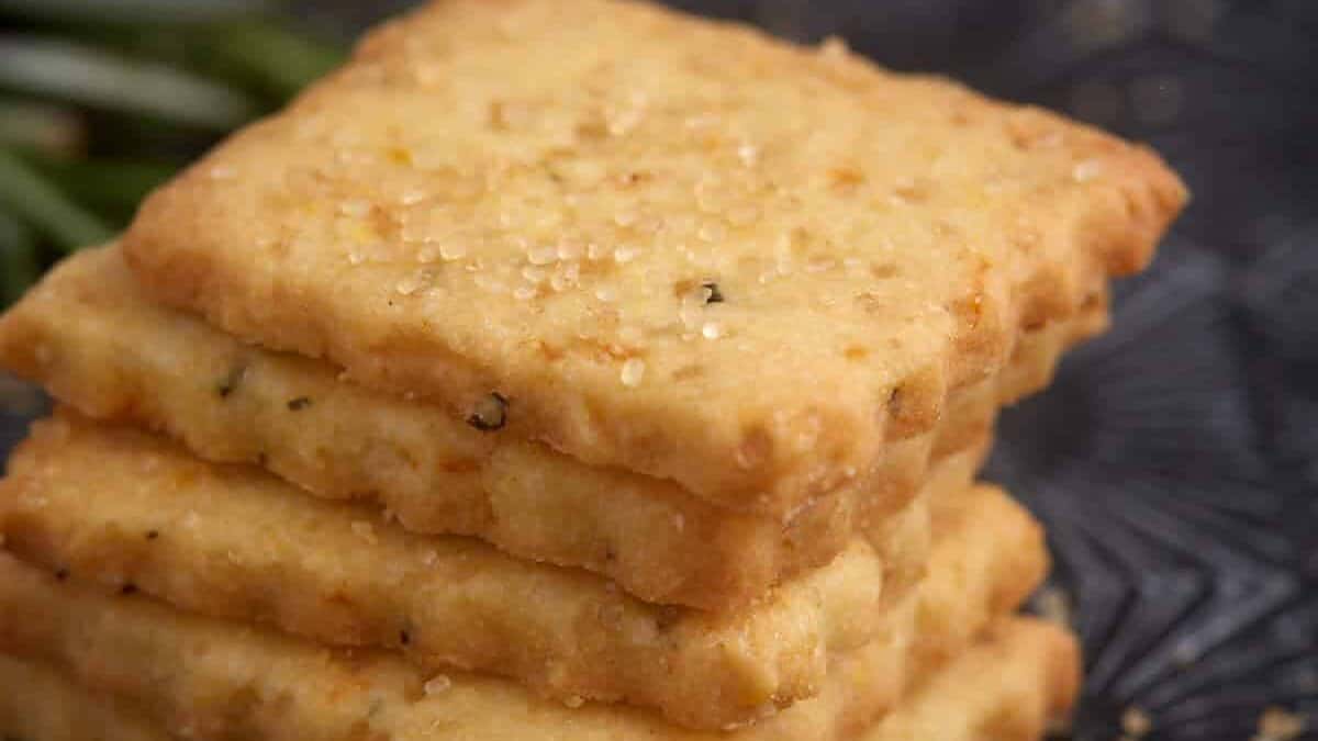 A stack of orange shortbread cookies.