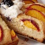 A slice of peach blackberry cake.