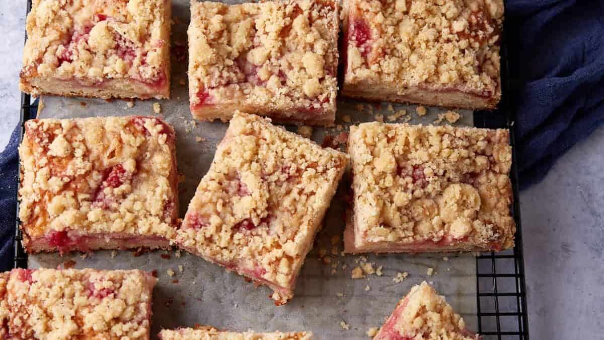 Rhubarb coffee cake cut into sqaures.