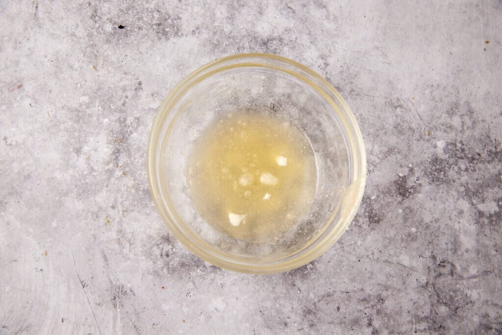 melted gelatin in a clear bowl. 