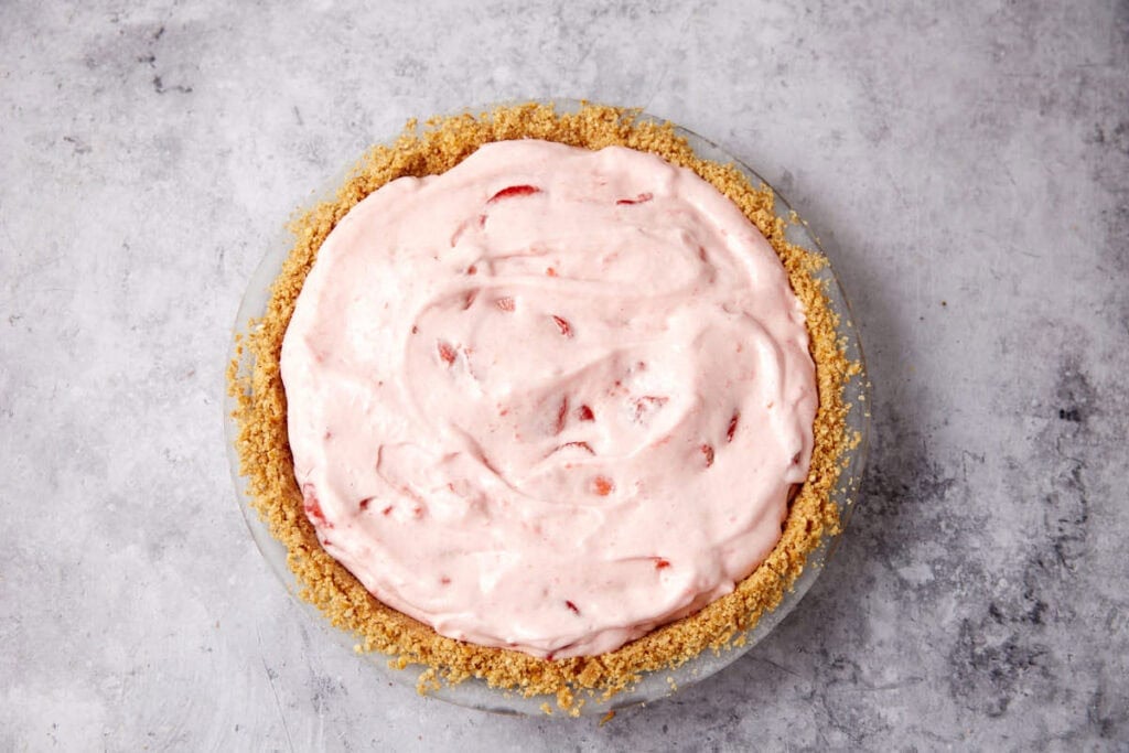 strawberry chiffon pie on a gray background. 