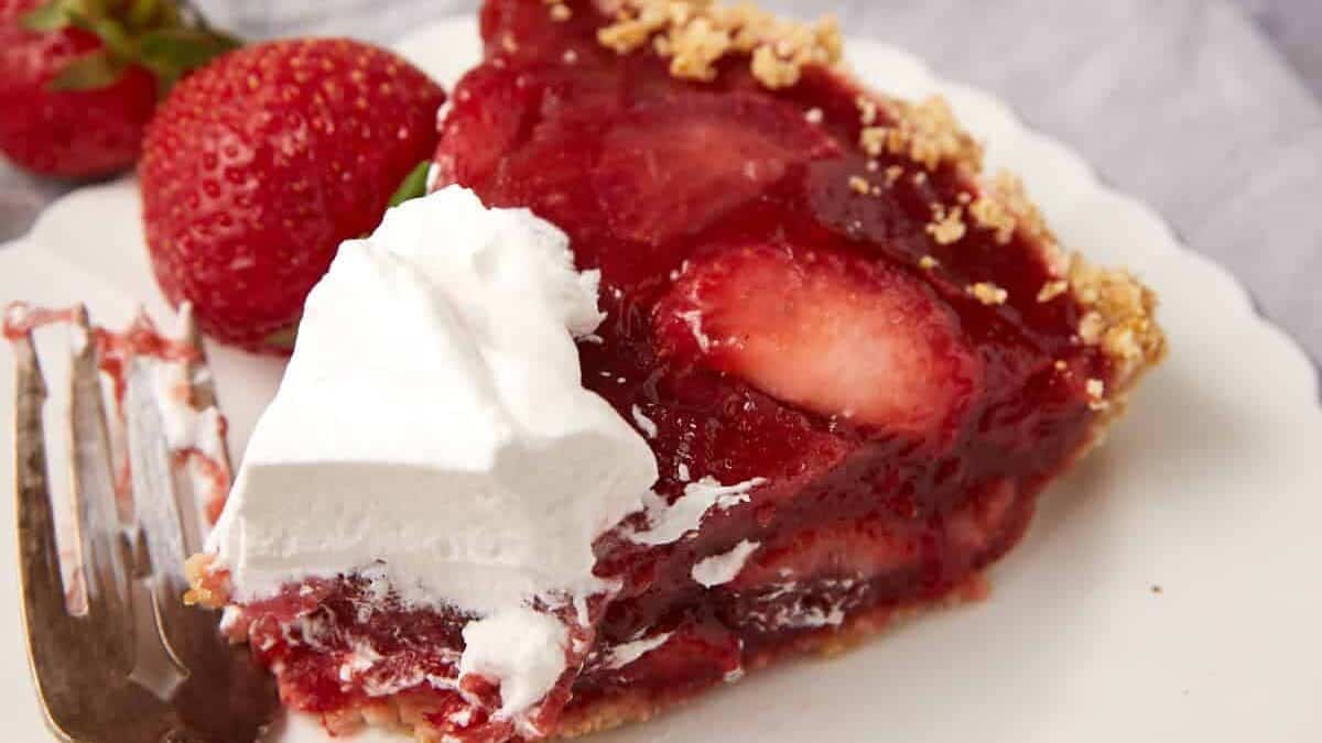 slice of strawberry icebox pie on a plate.