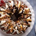 A banana split cake covered in toppings.