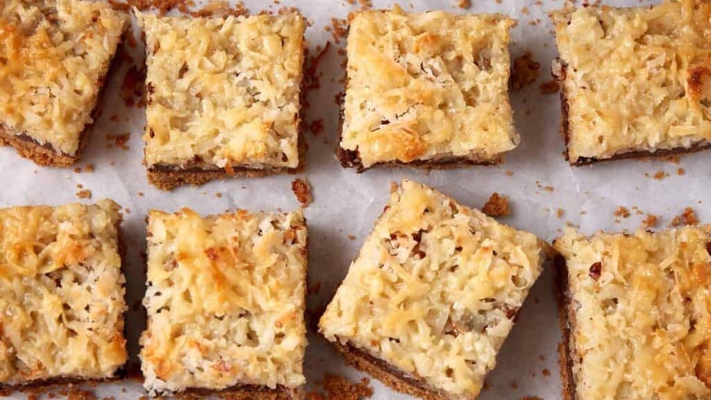 hello dolly bars on parchment paper.