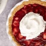 Strawberry icebox pie with whipped cream.