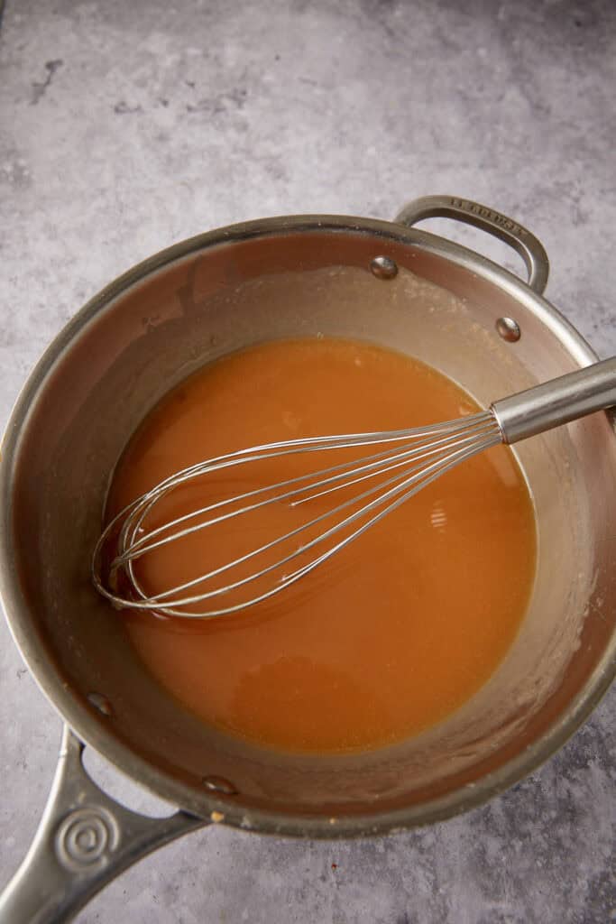 homemade caramel sauce in a saucepan.