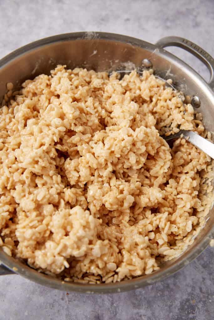 caramel Rice Krispie treat mixture in a saucepan.