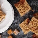 Carmelitas on a white dessert plate.