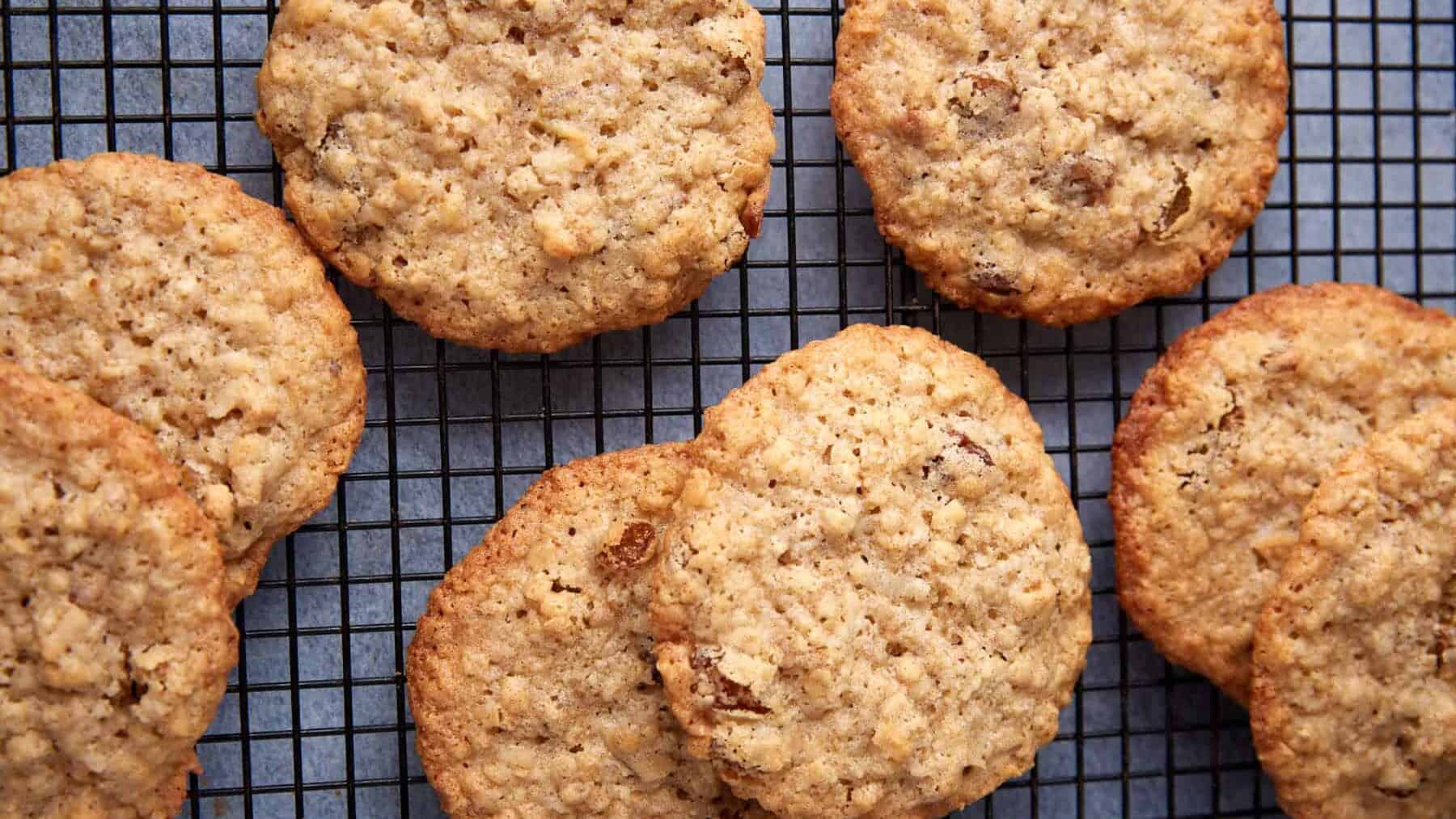 Oatmeal coconut cookies on a baking sheet.