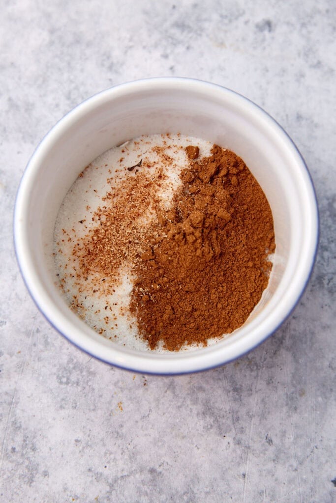 cinnamon, sugar and nutmeg in a bowl.