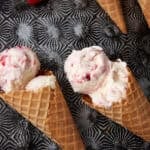 raspberry swirl ice cream in waffle cones.