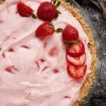 strawberry chiffon pie with a side of forks.