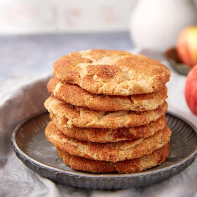 stack of apple snickerdoodle cookies on a. plate.