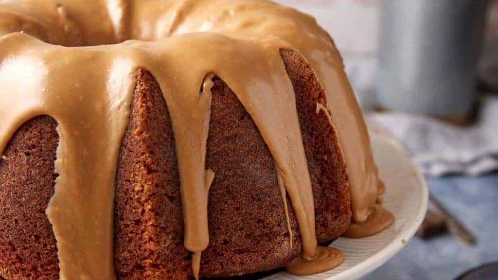 applesauce cake on a cake stand.