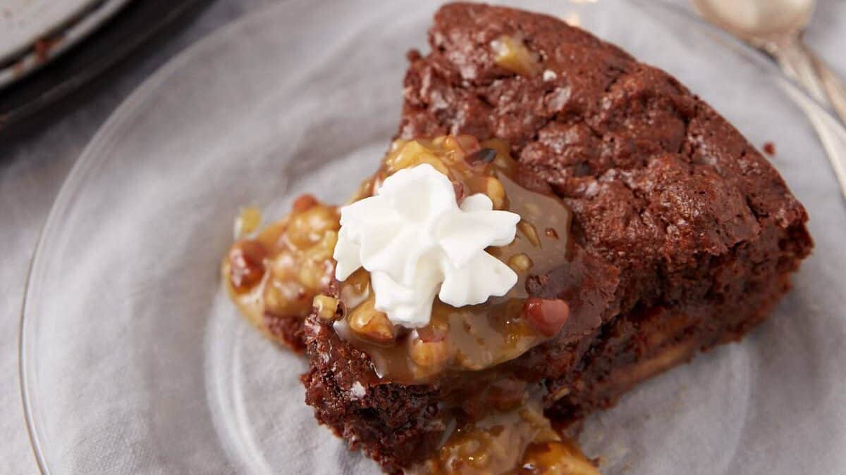 bourbon sauce over a slice of chocolate bread pudding.