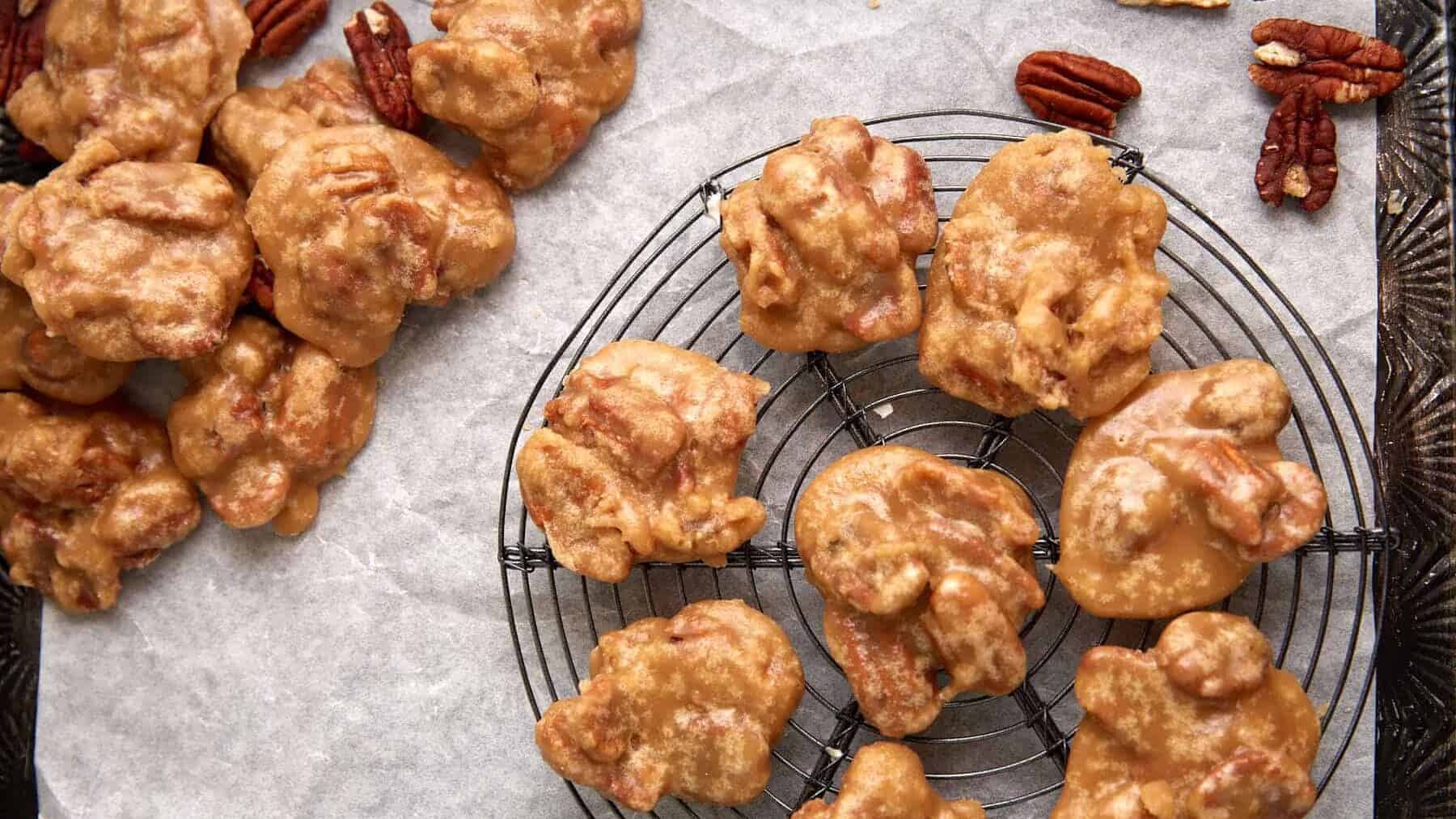 Pralines on a wire rack.