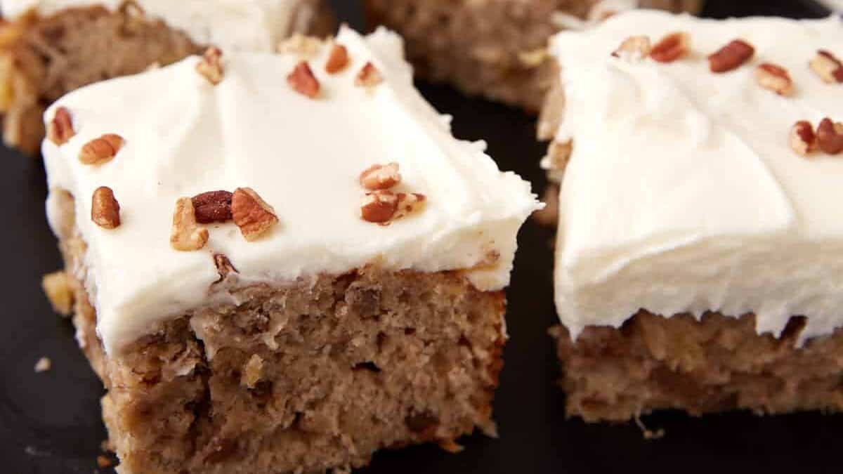 Pieces of hummingbird cake on a platter.