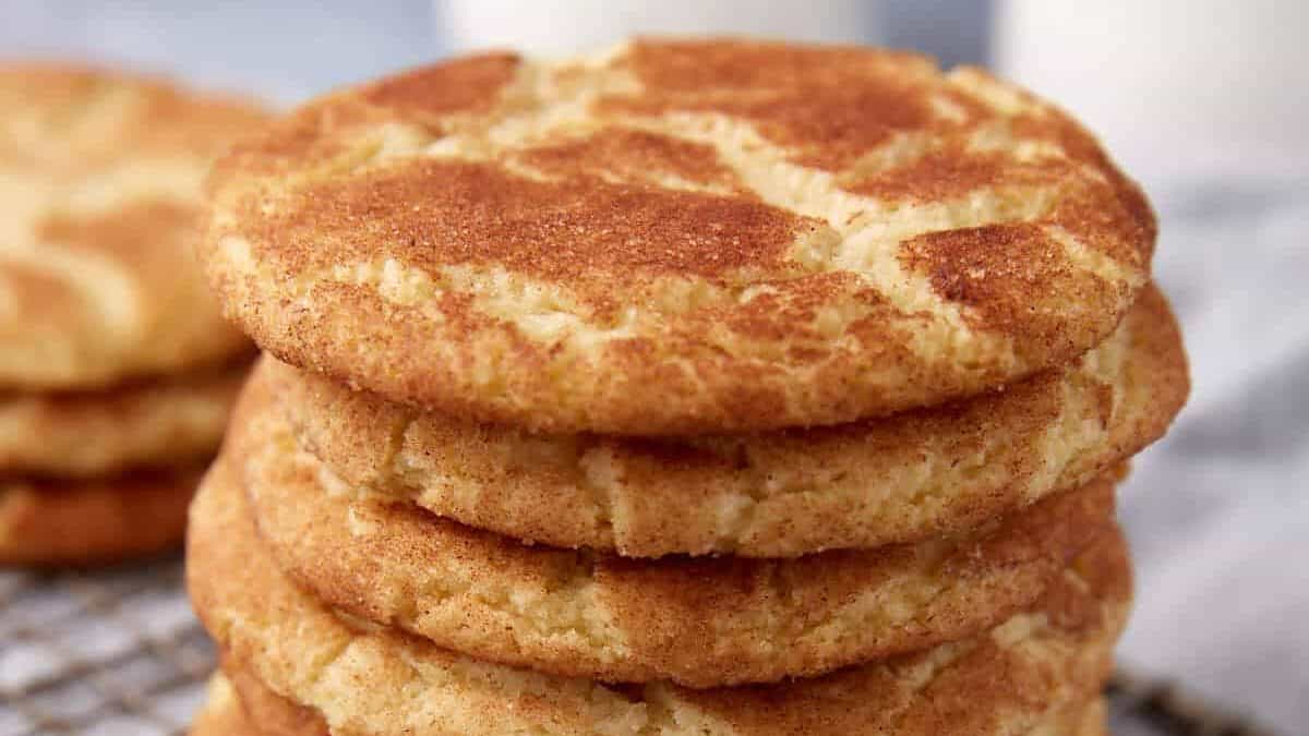 stack of snickerdoodle cookies on a wire rack.