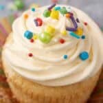 A single vanilla cupcake with the wrapper removed.