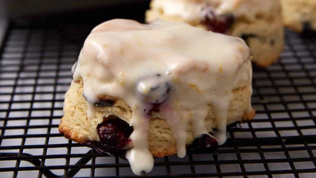 A biscuit dripping with frosting.