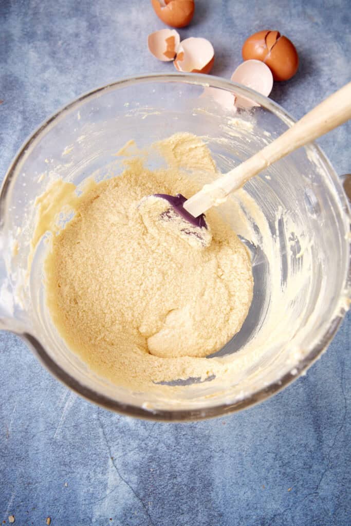 Chocolate cake batter in a mixing bowl, thick and smooth after mixing.