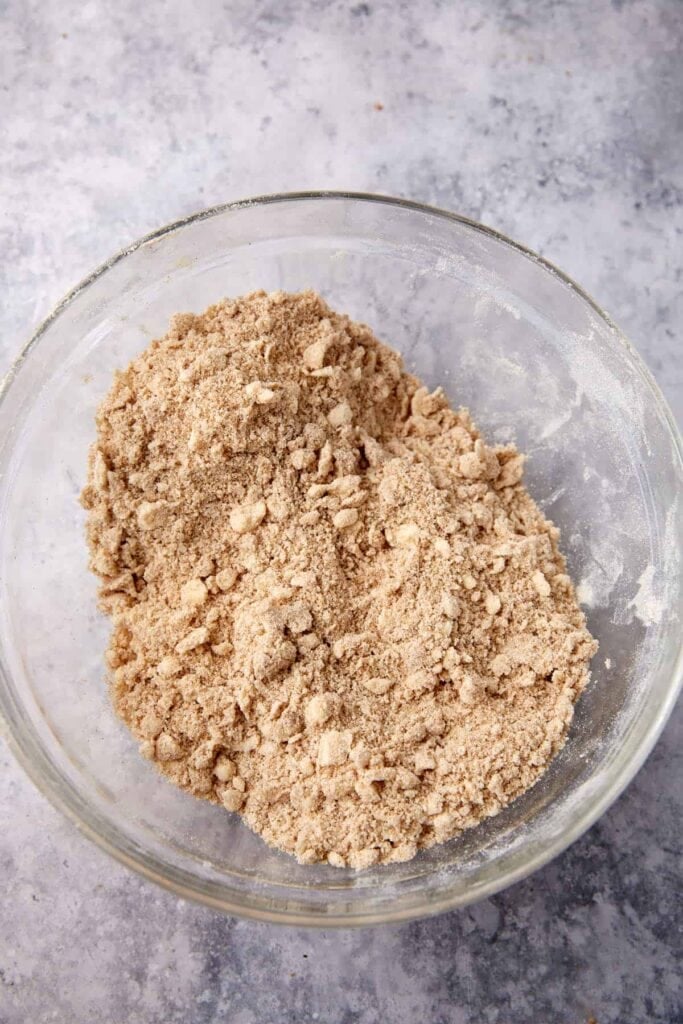 Cold butter cut into the flour and spice mixture with a pastry cutter for the crumble topping.