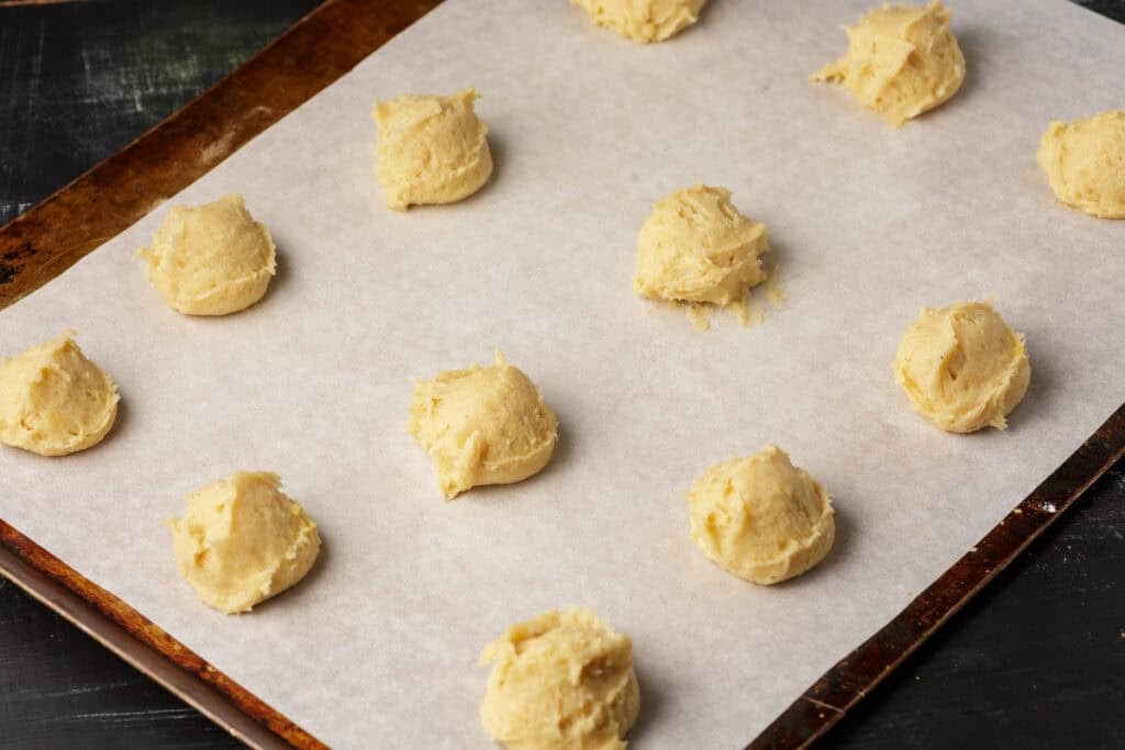 Cookie dough on a cookie sheet.